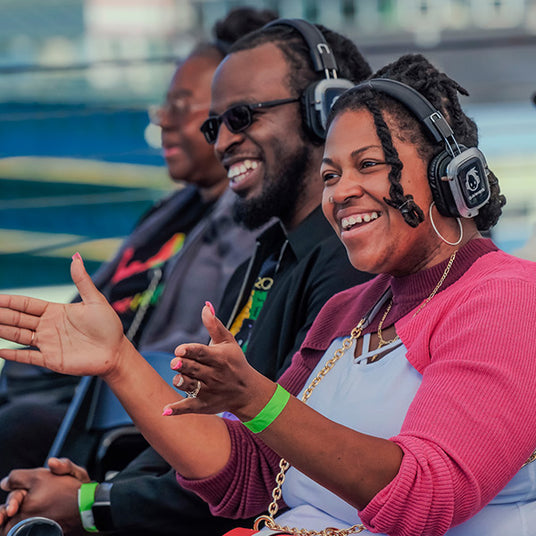 Silent Disco headphones for other quiet events a gathering of Black American enjoying listening with headphones
